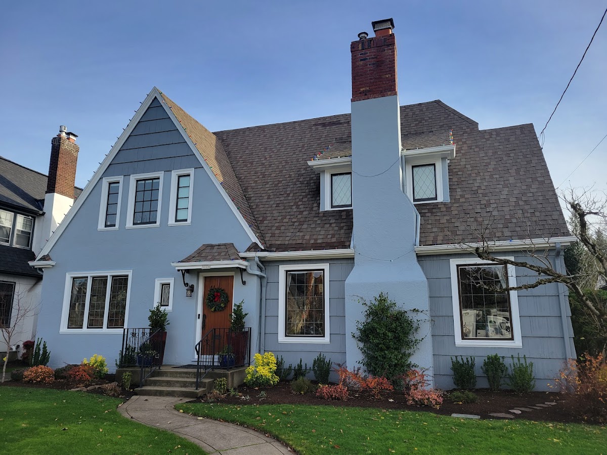 Freshly repainted home exterior with clean siding